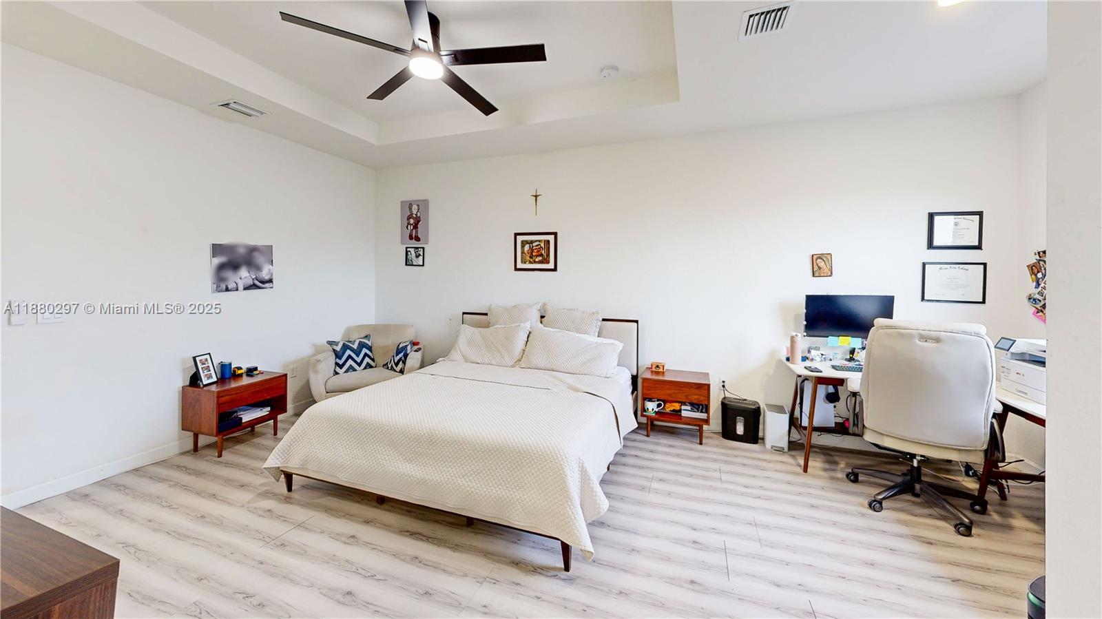 24902 Southwest 107th Avenue Homestead, FL 33032 - Photo 27 of 73 a bedroom with a bed and wooden floor