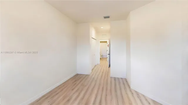 a bedroom with a bed and a bed