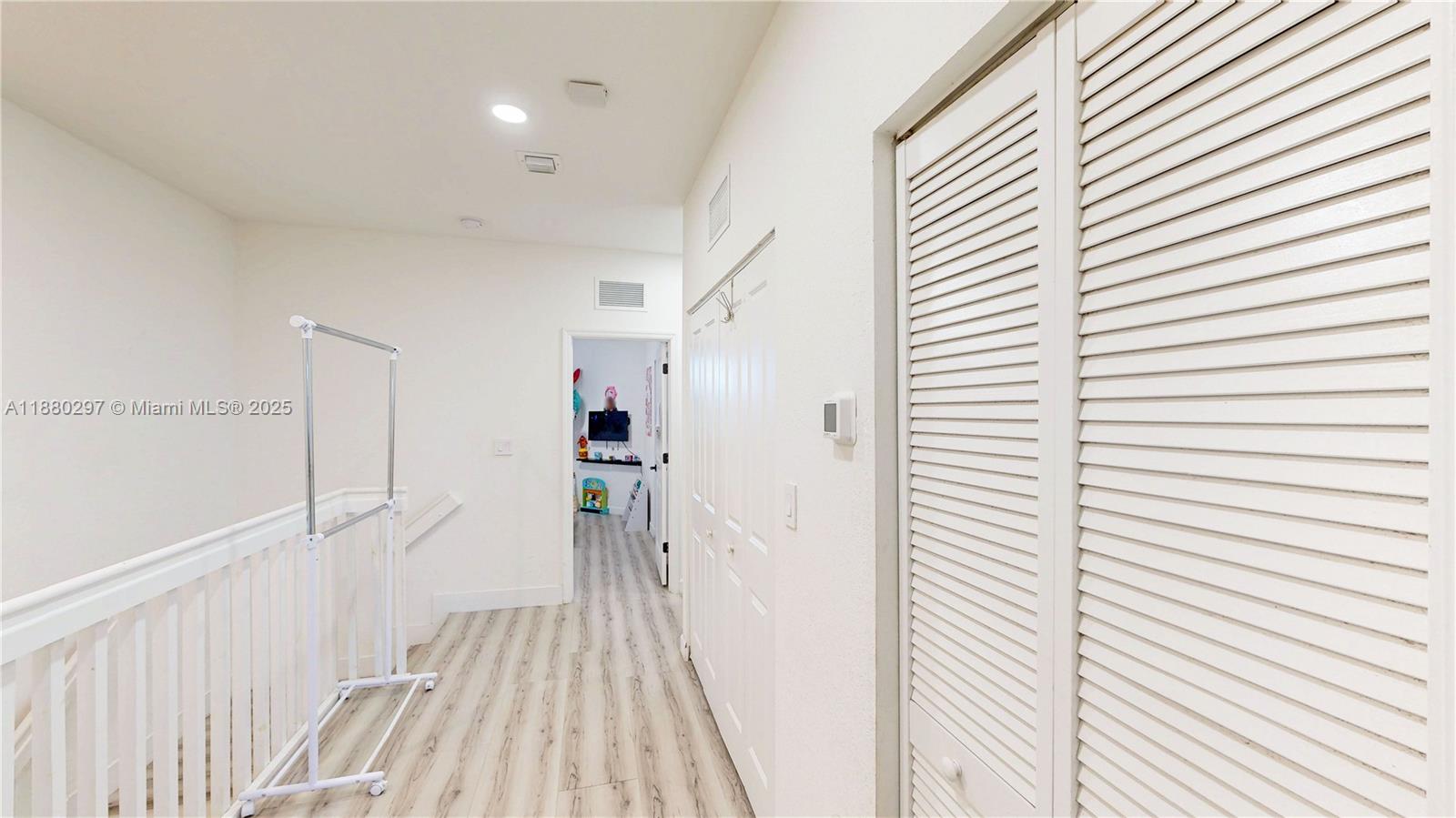 24902 Southwest 107th Avenue Homestead, FL 33032 - Photo 33 of 73 a view of a walk in closet