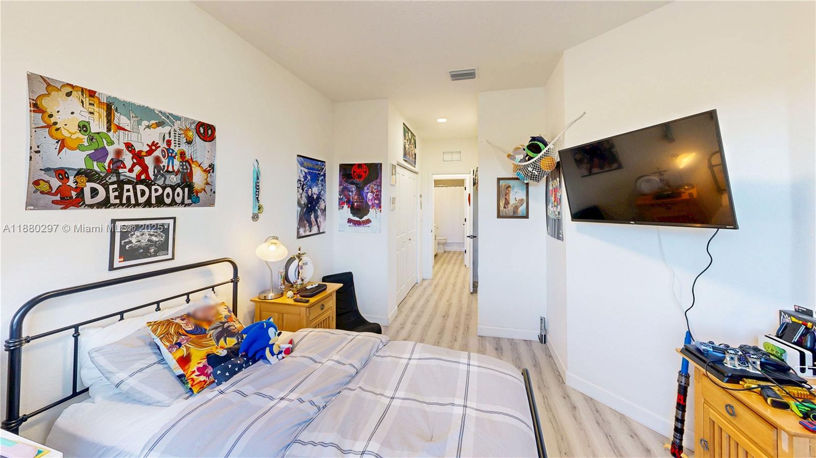 24902 Southwest 107th Avenue Homestead, FL 33032 - Photo 39 of 73 a living room with furniture and a flat screen tv