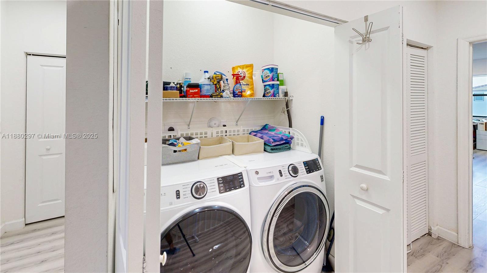24902 Southwest 107th Avenue Homestead, FL 33032 - Photo 42 of 73 a view of storage and utility room with washer and dryer
