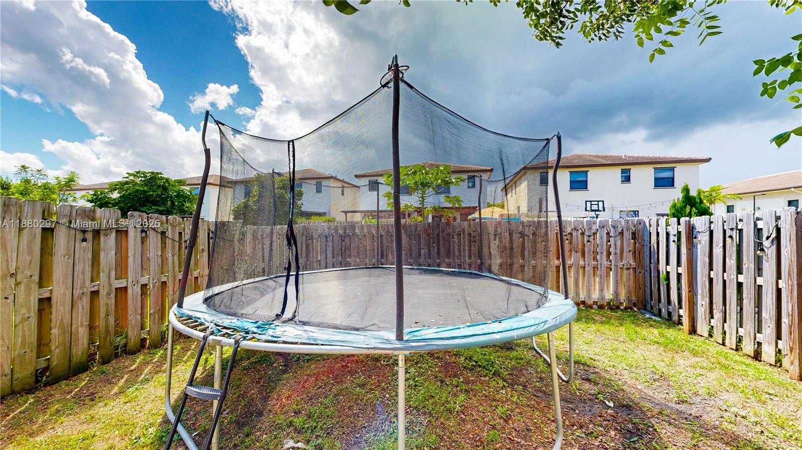 24902 Southwest 107th Avenue Homestead, FL 33032 - Photo 45 of 73 a view of a backyard with swimming pool