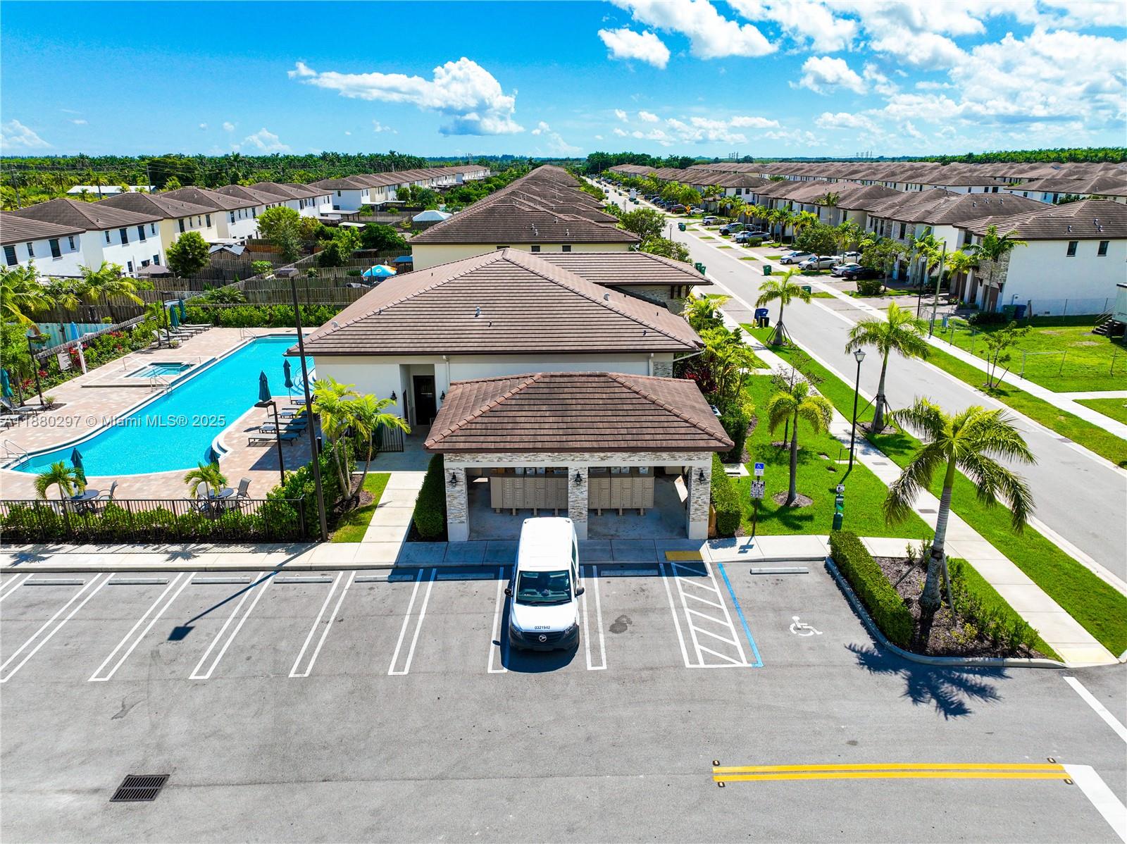 24902 Southwest 107th Avenue Homestead, FL 33032 - Photo 65 of 73 an aerial view of a house with swimming pool patio and outdoor seating
