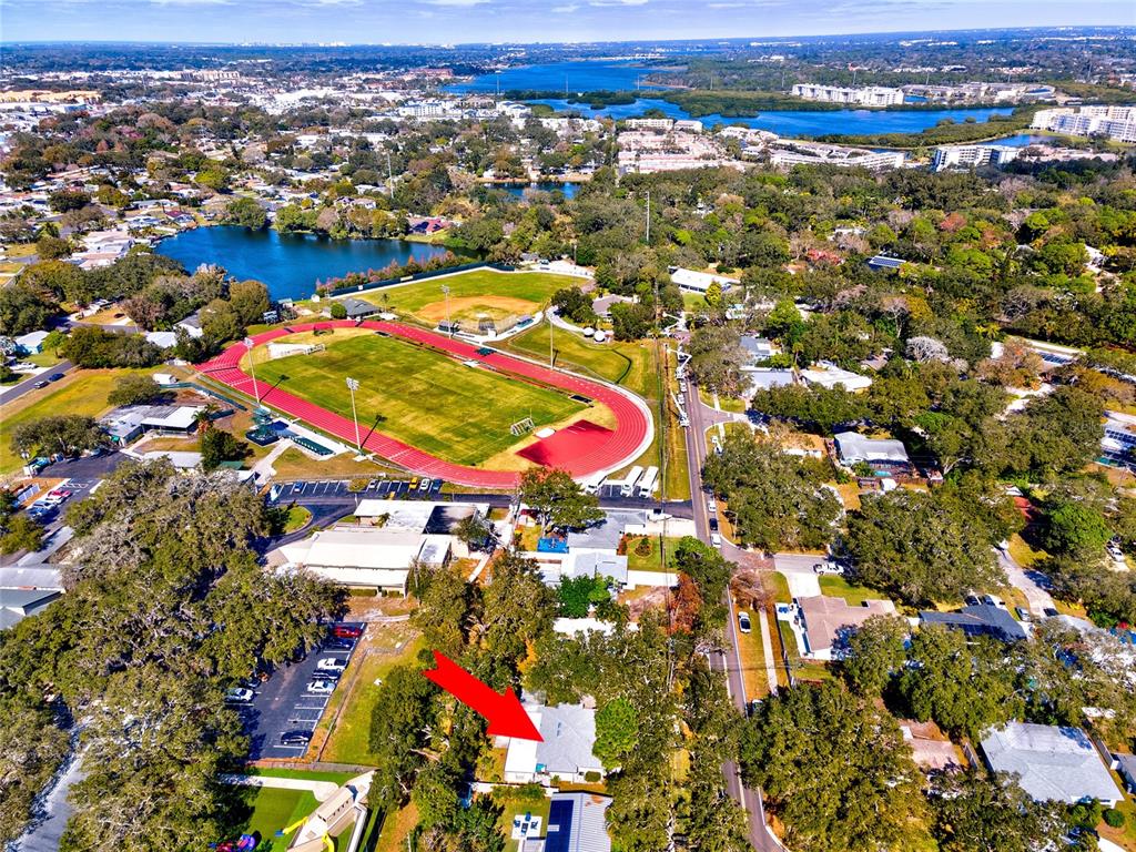 5596 100th Way North St. Petersburg, FL 33708 - Photo 64 of 67 an aerial view of residential building and parking space