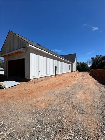 a view of an empty room with a yard