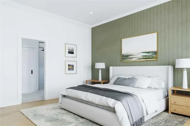 a bedroom with a bed and a couch