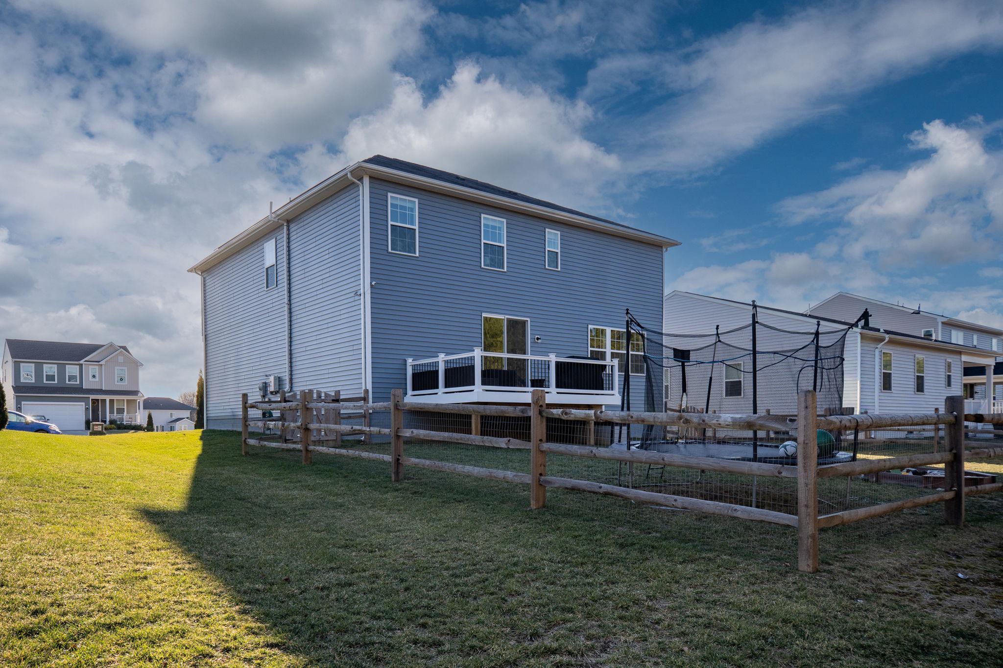 6371 Pointer Lane King George, VA 22485 - Photo 35 of 38 a view of a house with a yard