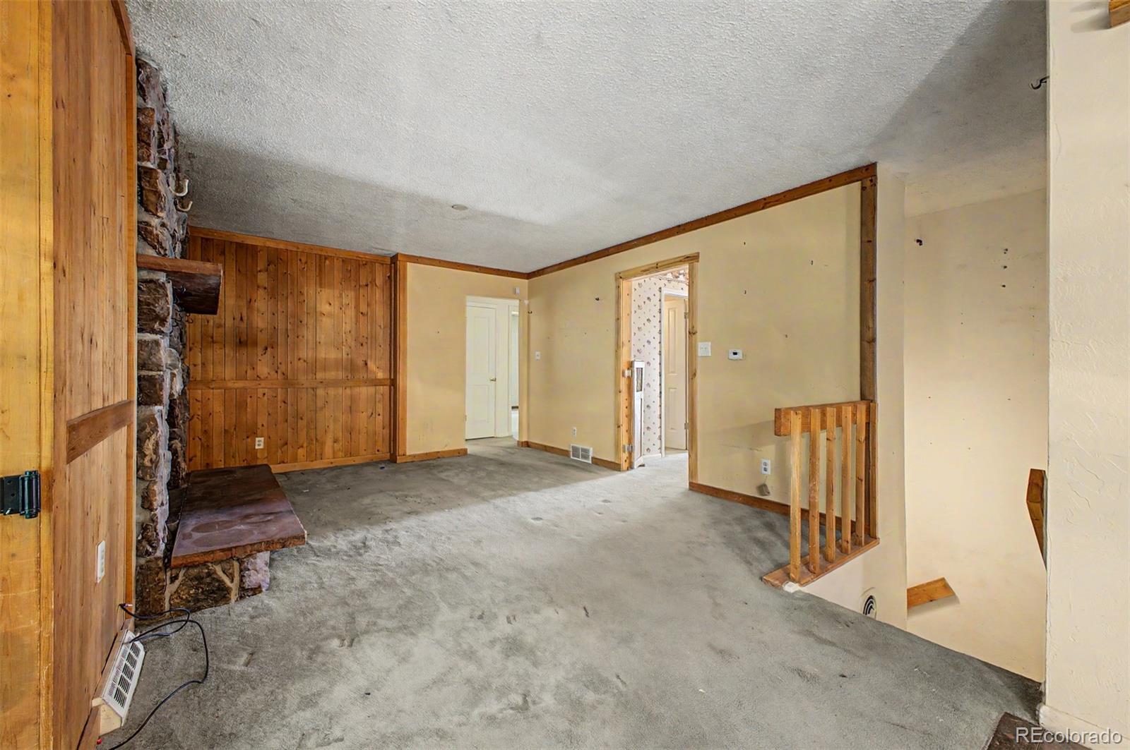 1600 Northwestern Road Longmont, CO 80503 - Photo 15 of 41 an empty room with a window and storage