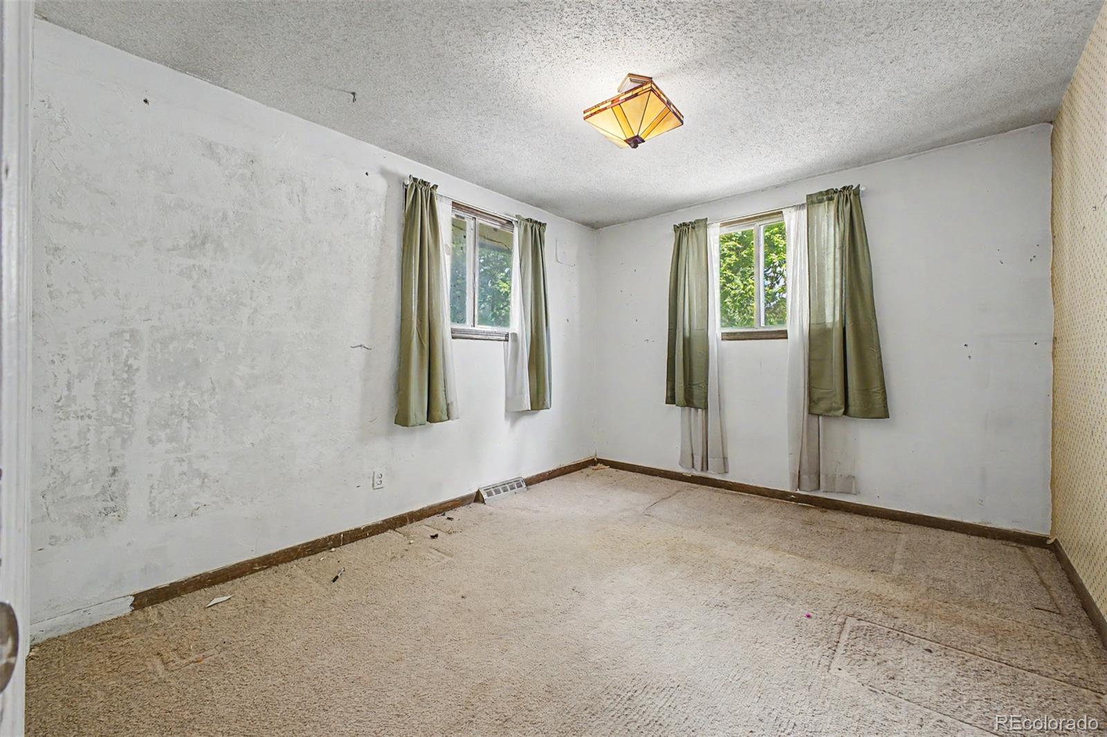 1600 Northwestern Road Longmont, CO 80503 - Photo 16 of 41 an empty room with windows