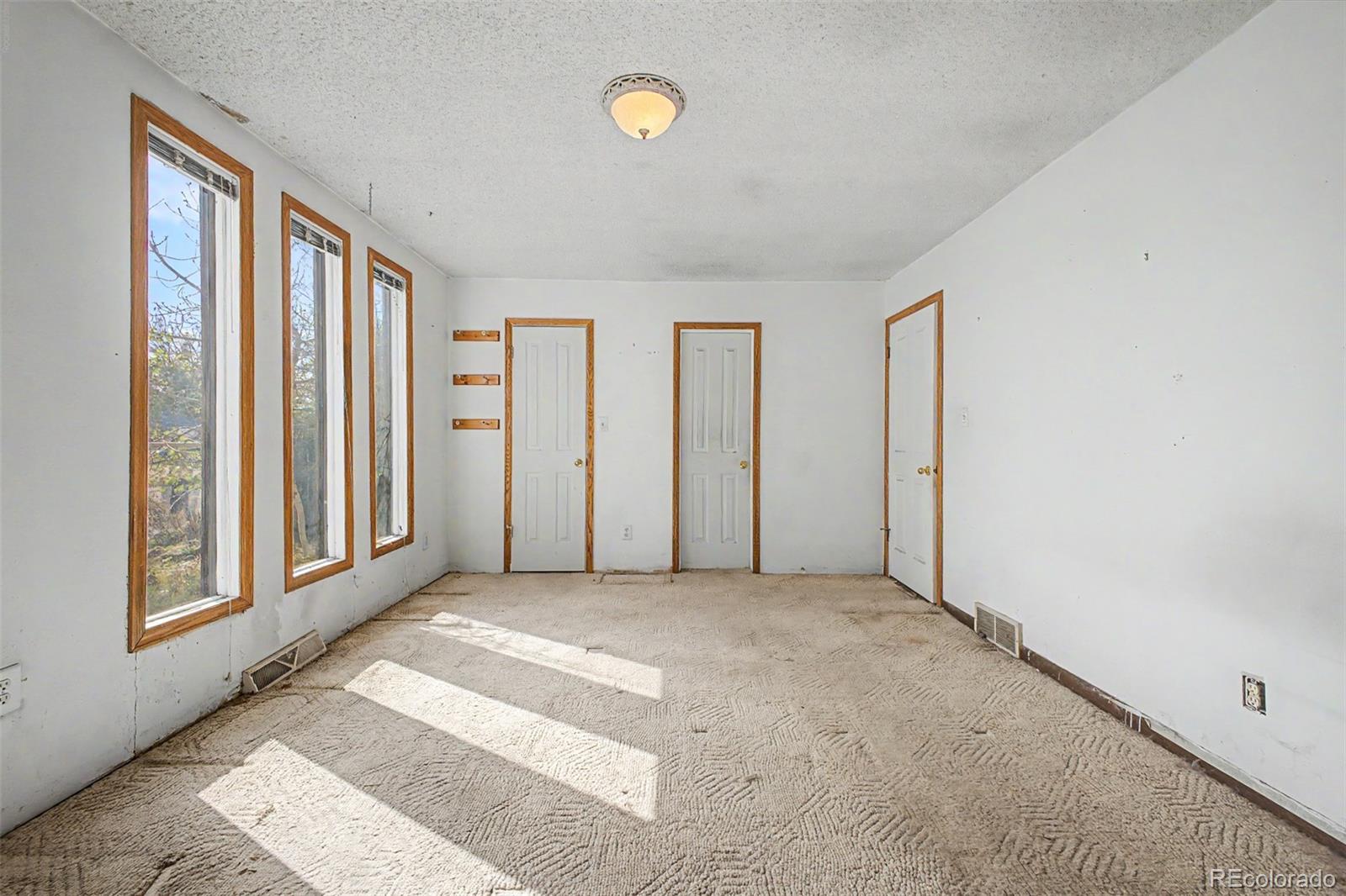 1600 Northwestern Road Longmont, CO 80503 - Photo 21 of 41 an empty room with windows