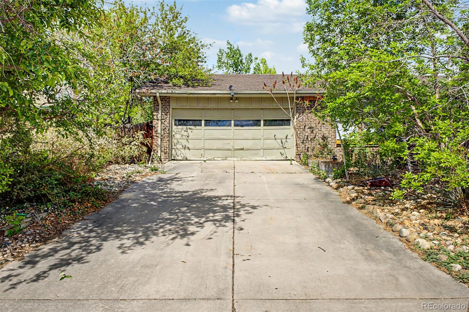 1600 Northwestern Road Longmont, CO 80503 - Photo 3 of 41 a front view of a house with a yard