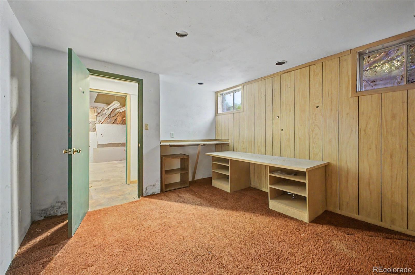 1600 Northwestern Road Longmont, CO 80503 - Photo 34 of 41 a view of a bedroom with furniture and windows