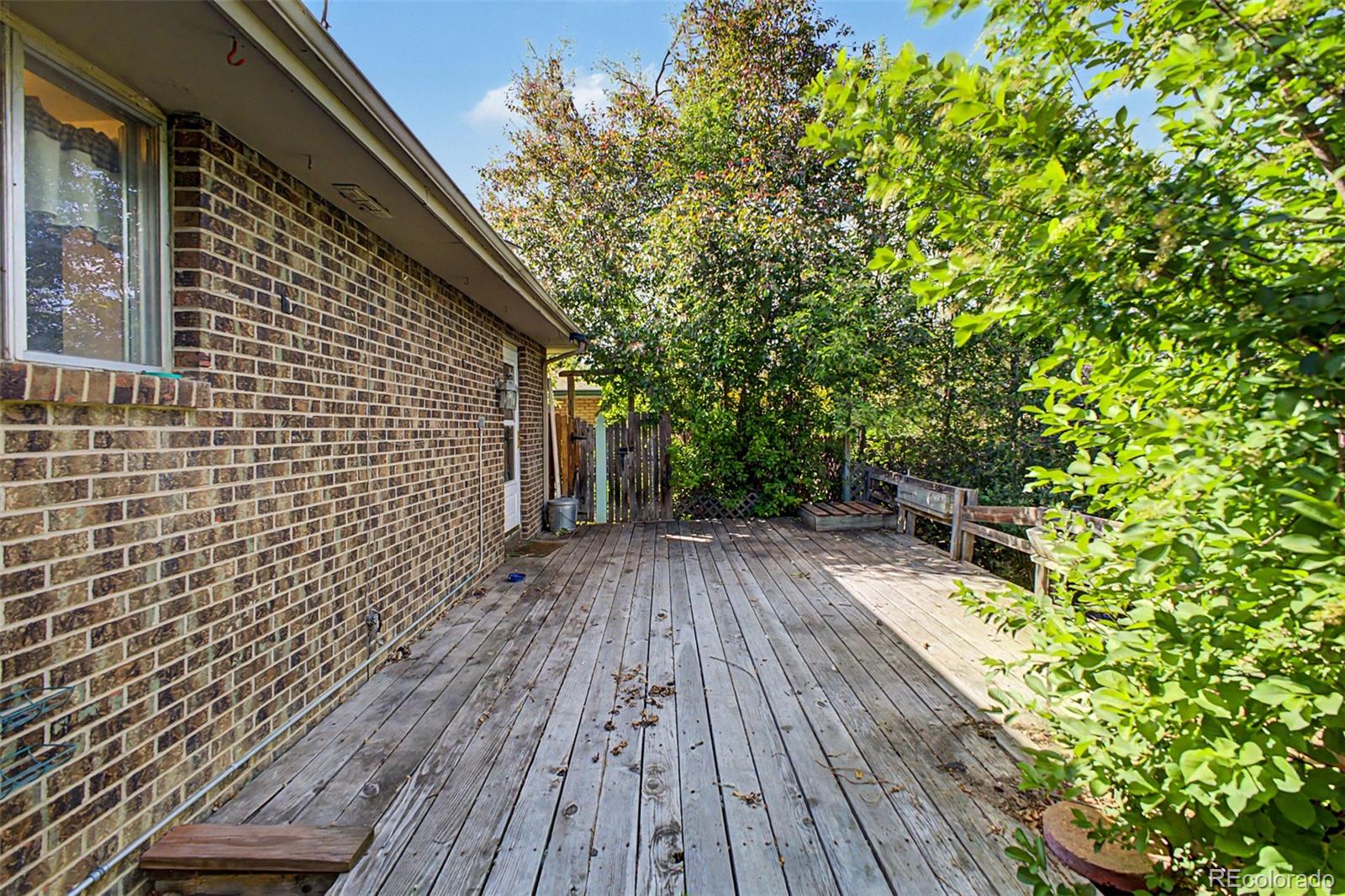 1600 Northwestern Road Longmont, CO 80503 - Photo 38 of 41 a backyard of a house with wooden floor
