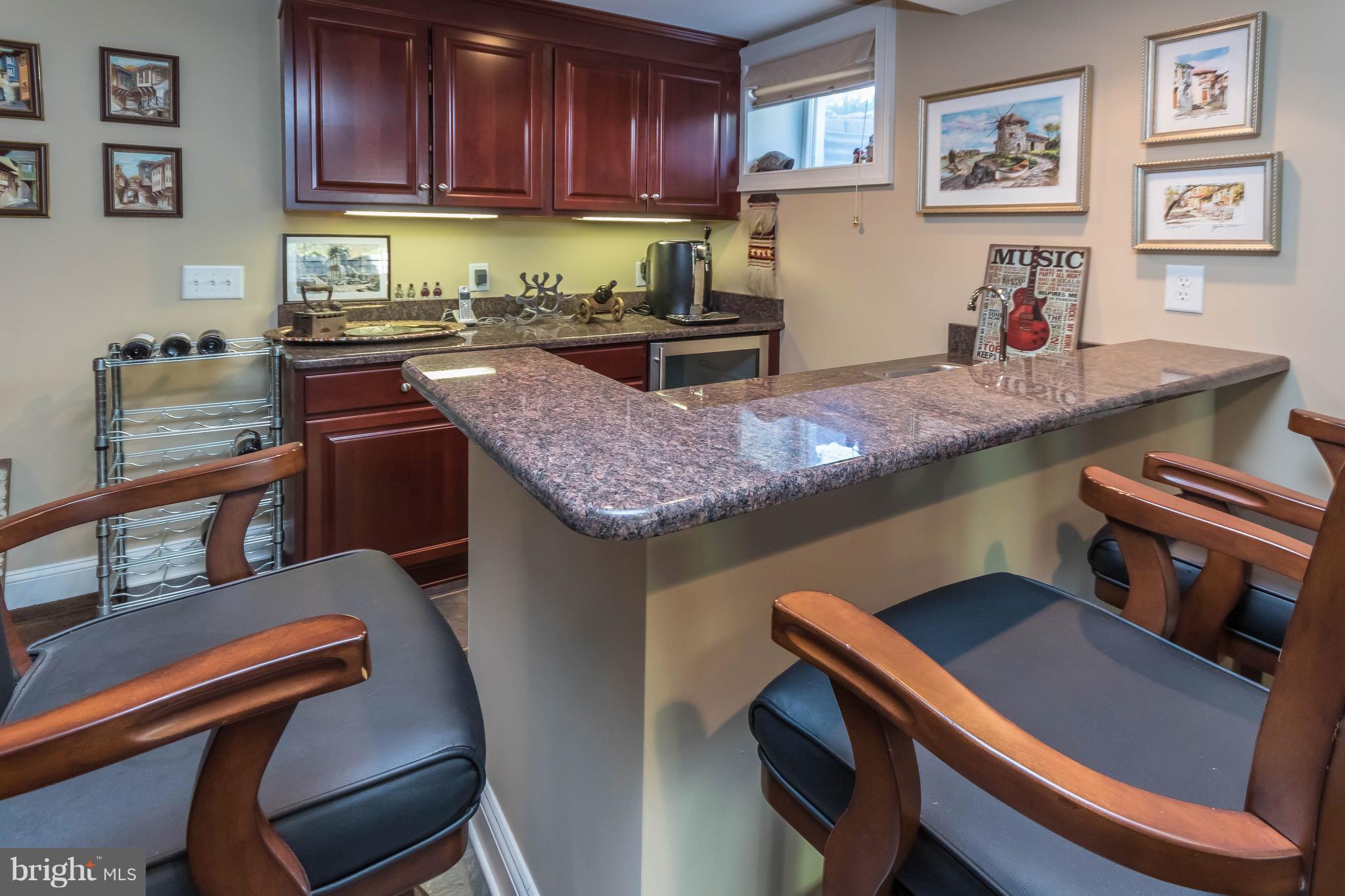 940 Hilltop Road Arnold, MD 21012 - Photo 24 of 30 ...features a refined, welcoming wet bar...