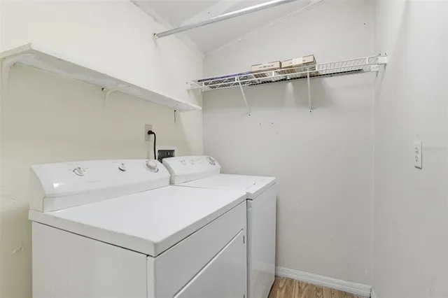 a utility room with dryer and washer