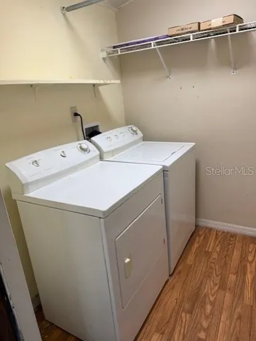 a utility room with dryer and washer