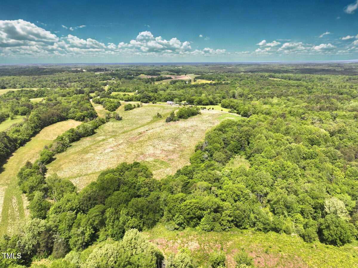 1 Longs Mill Road Blanch, NC 27212 - Photo 19 of 31 a view of a lake from a yard