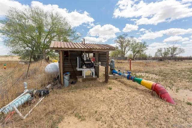 a view of a swimming pool and an outdoor space