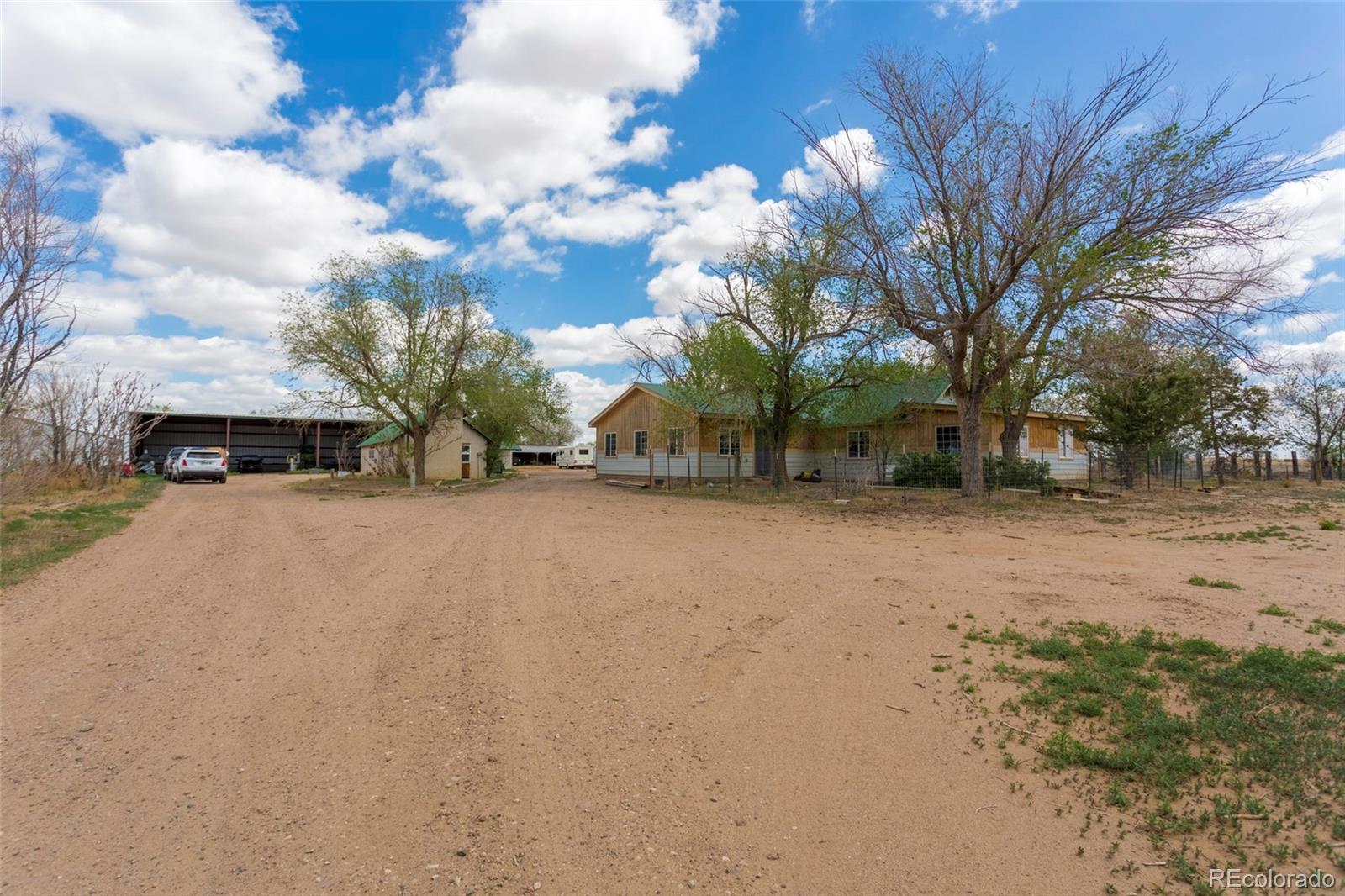 21550 Hanover Road Colorado Springs, CO 80928 - Photo 26 of 29 a view of road with trees