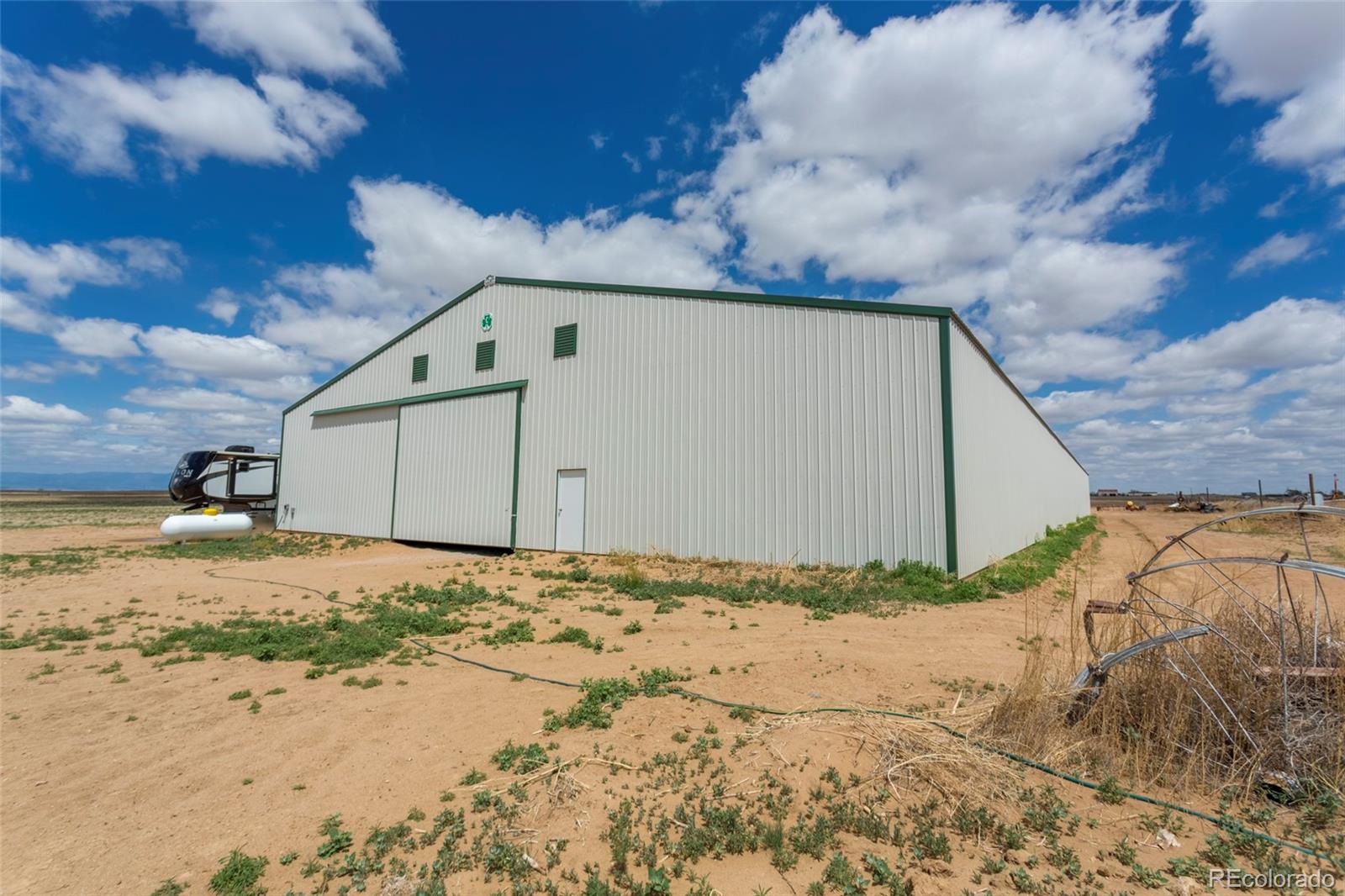 21550 Hanover Road Colorado Springs, CO 80928 - Photo 8 of 29 a view of back yard of the house