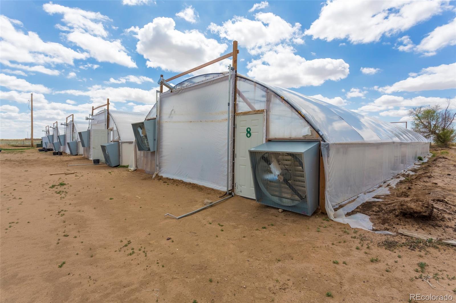 21550 Hanover Road Colorado Springs, CO 80928 - Photo 10 of 29 a view of a house with a snow in the yard