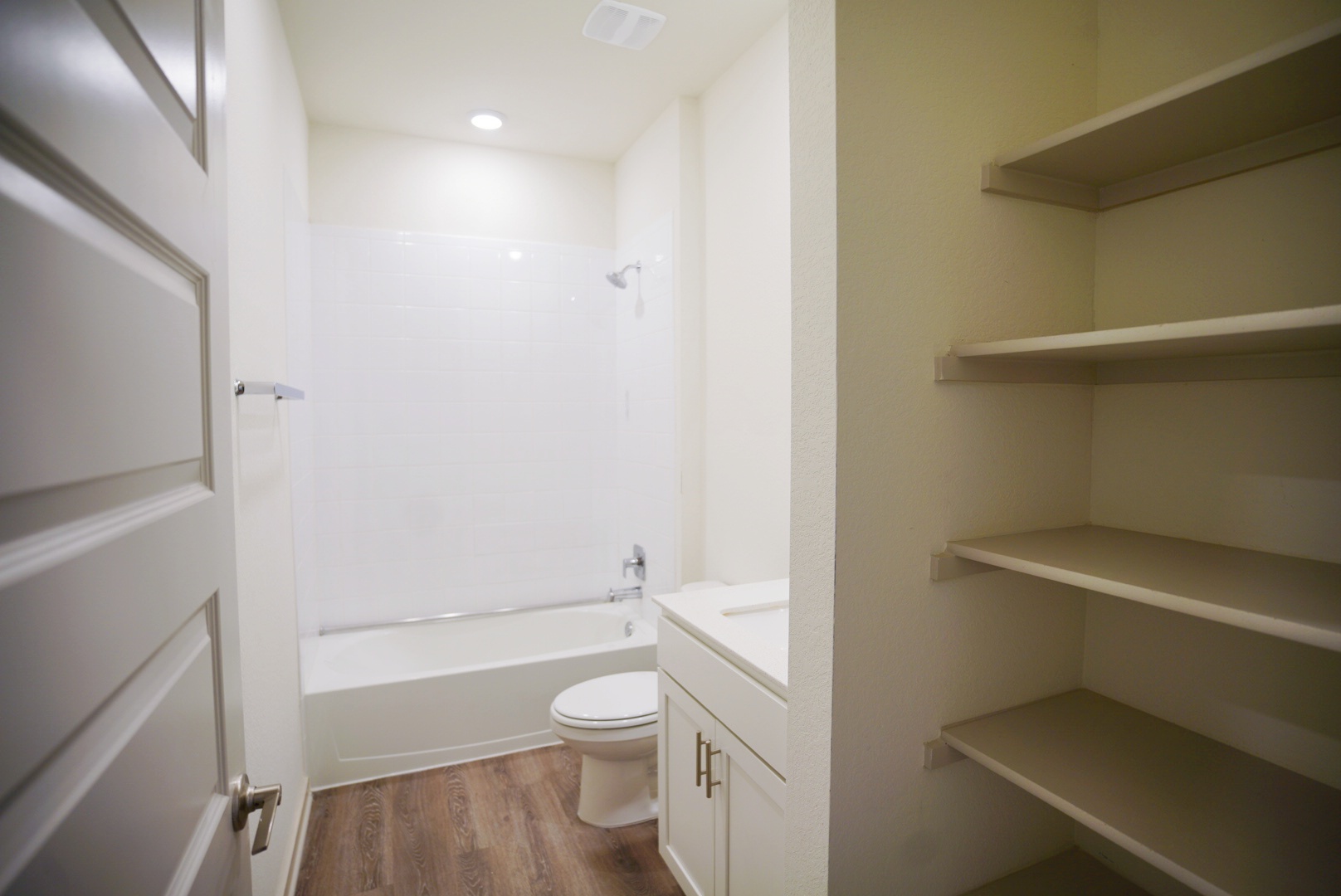 10601 Gonzales Ranger Pass Austin, TX 78754 - Photo 8 of 17 a bathroom with a toilet and a shower