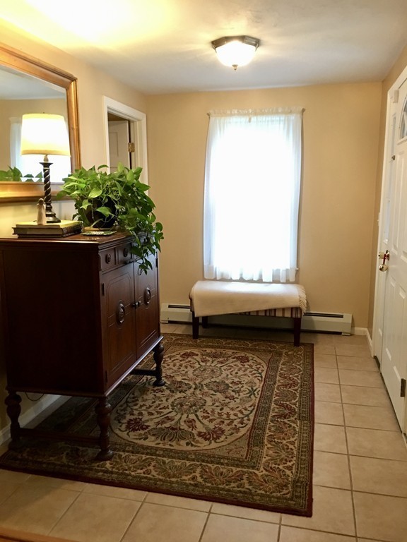 41 Prescott Street Rutland, MA 01543 - Photo 18 of 30 a living room with furniture and a rug