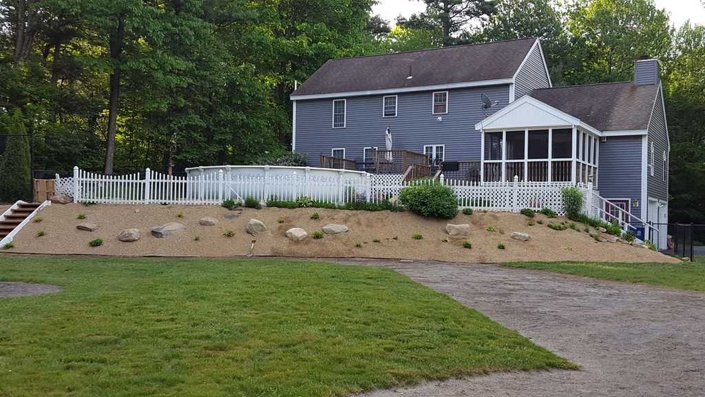 41 Prescott Street Rutland, MA 01543 - Photo 4 of 30 a front view of a house with a garden