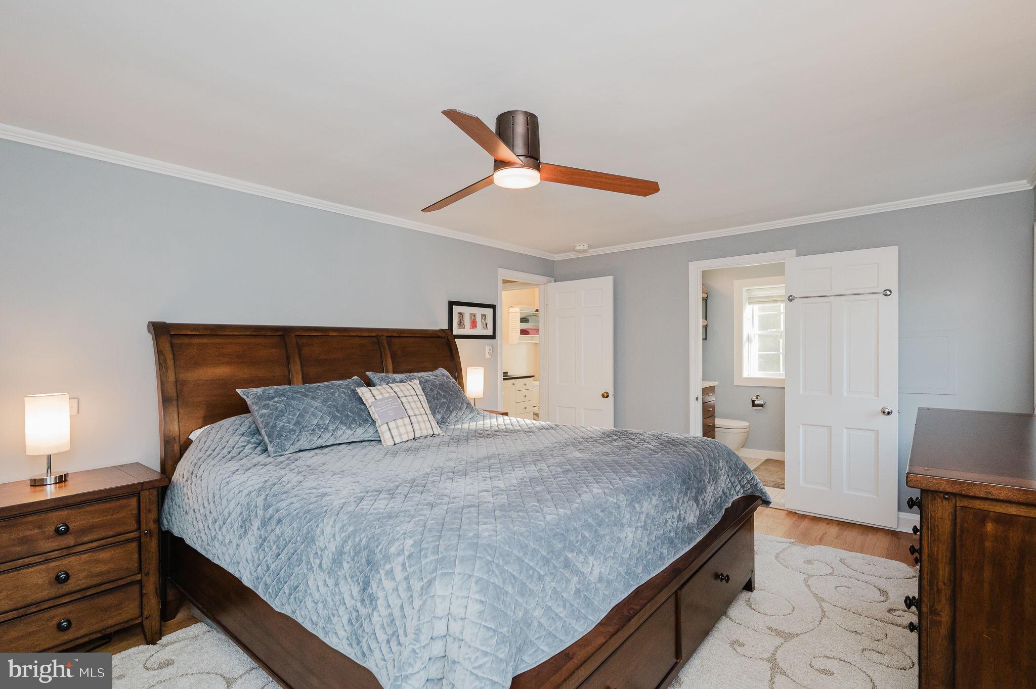 625 Yarmouth Road Towson, MD 21286 - Photo 27 of 69 a bedroom with a bed and wooden floor