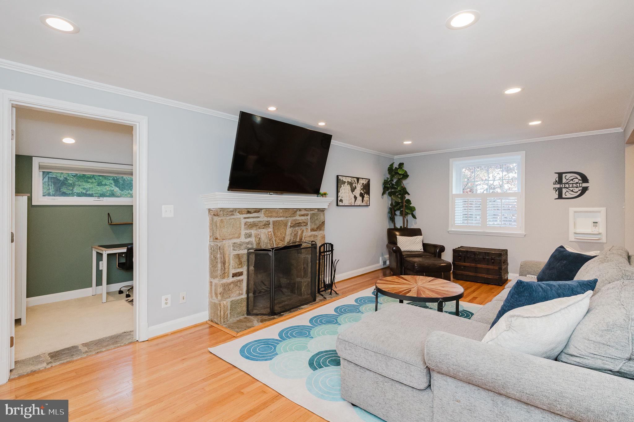 625 Yarmouth Road Towson, MD 21286 - Photo 6 of 69 a living room with furniture fireplace and flat screen tv