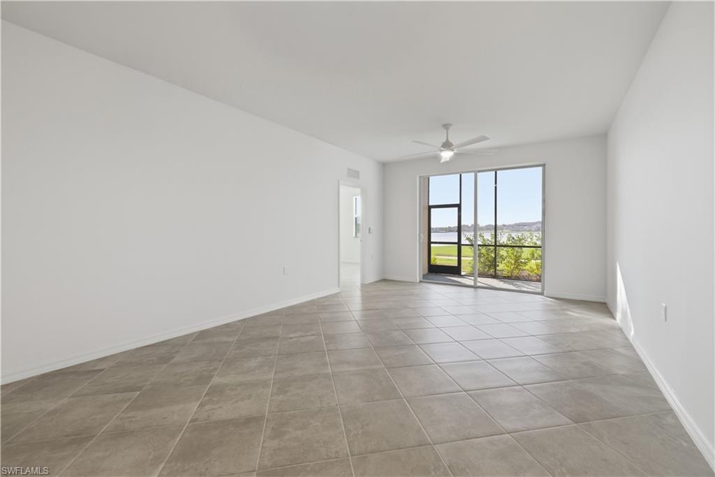 5555 Double Eagle Circle, Unit 3915 Ave Maria, FL 34142 - Photo 17 of 33 a view of an empty room with a window