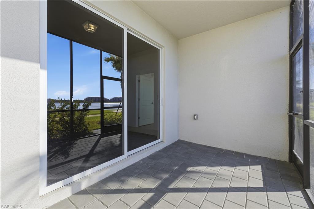 5555 Double Eagle Circle, Unit 3915 Ave Maria, FL 34142 - Photo 8 of 33 a view of an empty room and window