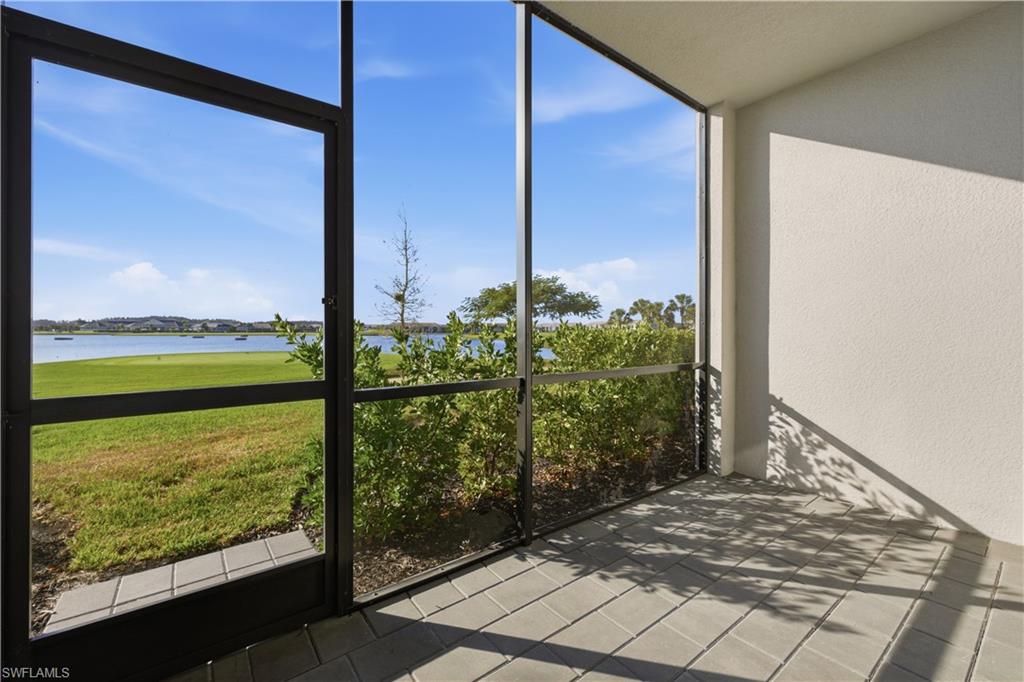 5555 Double Eagle Circle, Unit 3915 Ave Maria, FL 34142 - Photo 9 of 33 a view of a floor to ceiling window and an ocean view