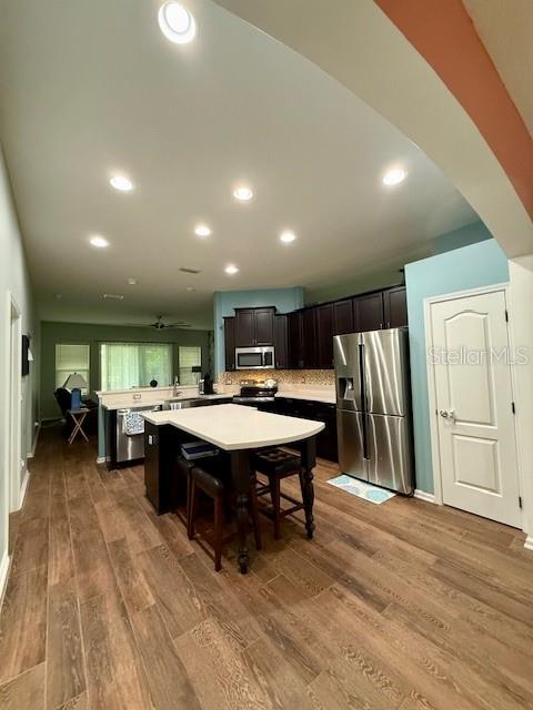 86351 Moonlit Walk Circle Yulee, FL 32097 - Photo 14 of 53 a large kitchen with a table and chairs in it