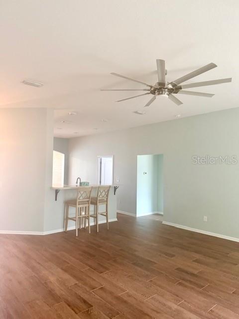 86351 Moonlit Walk Circle Yulee, FL 32097 - Photo 19 of 53 a view of a work space with furniture and wooden floor