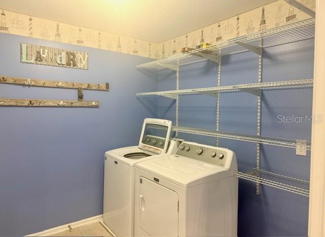 86351 Moonlit Walk Circle Yulee, FL 32097 - Photo 36 of 53 a utility room with dryer and washer