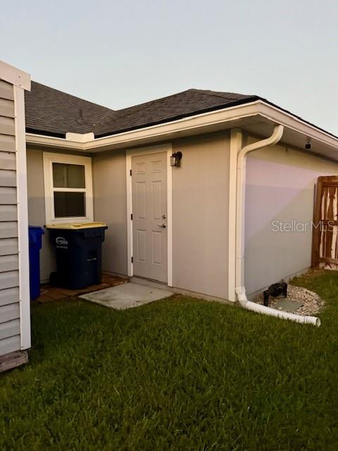 86351 Moonlit Walk Circle Yulee, FL 32097 - Photo 42 of 53 a backyard of a house with lots of green space