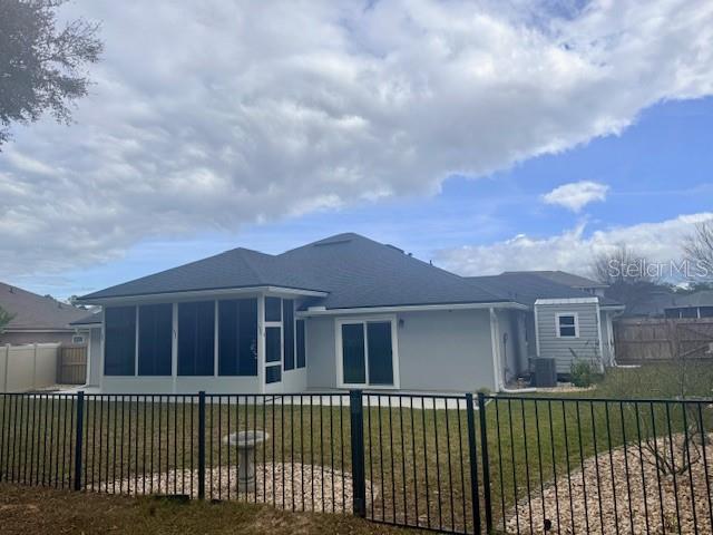 86351 Moonlit Walk Circle Yulee, FL 32097 - Photo 44 of 53 front view of a house with a yard