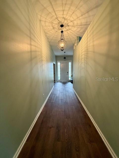 86351 Moonlit Walk Circle Yulee, FL 32097 - Photo 9 of 53 a view of a hallway with wooden floor