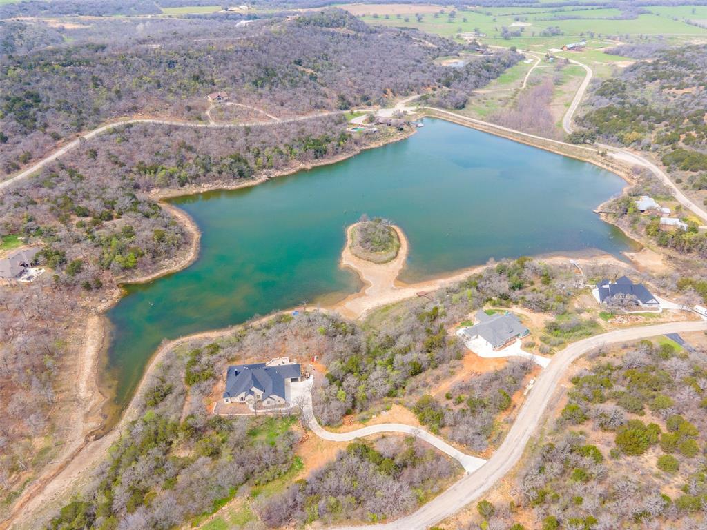 E49 R Art's Way Gordon, TX 76453 - Photo 21 of 26 Overhead perspective of property near The Cove at Lake McIntire with clubhouse, pool, fishing pier, and boating