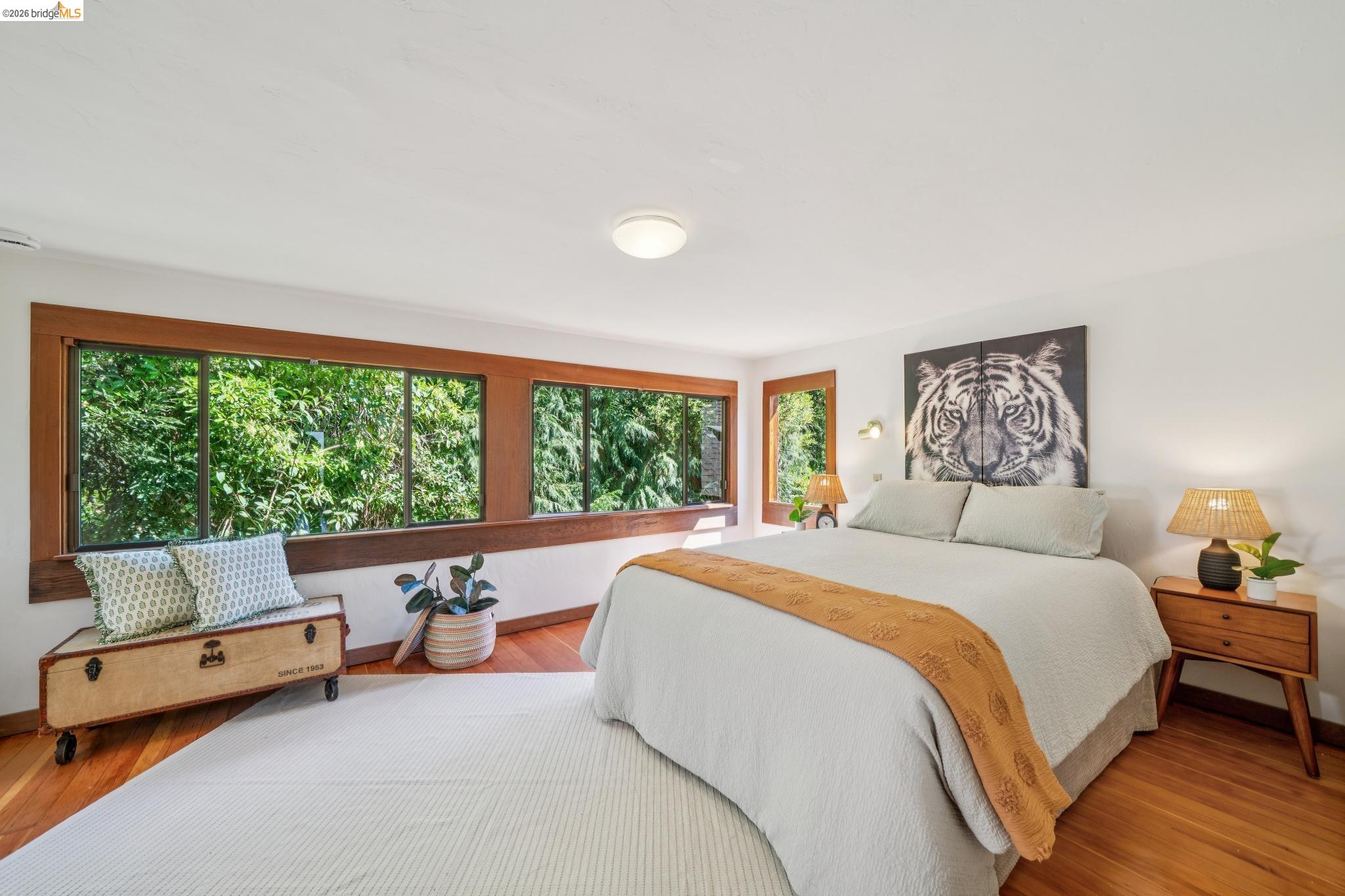 813 San Diego Road Berkeley, CA 94707 - Photo 45 of 60 a spacious bedroom with a bed and a large window