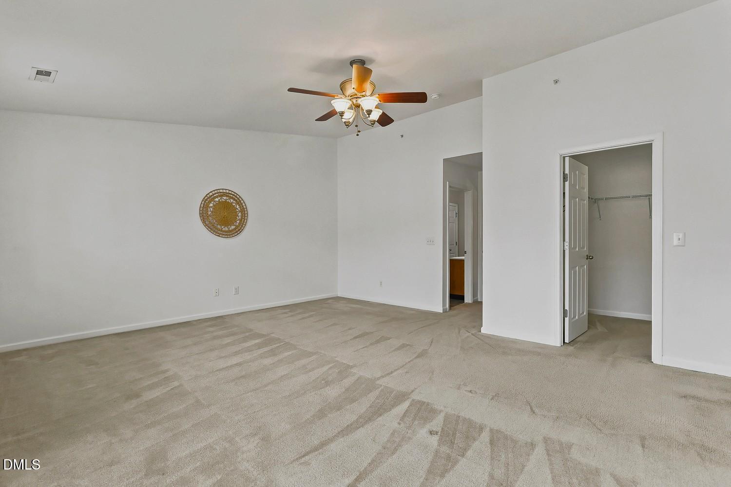8620 Neuse Club Lane, Unit 107 Raleigh, NC 27616 - Photo 21 of 33 021-021-Primary Bedroom-1500x1000