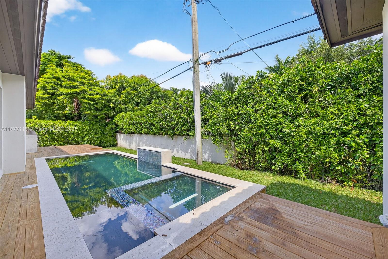 635 Bird Road Coral Gables, FL 33146 - Photo 20 of 25 a view of a backyard with sitting area