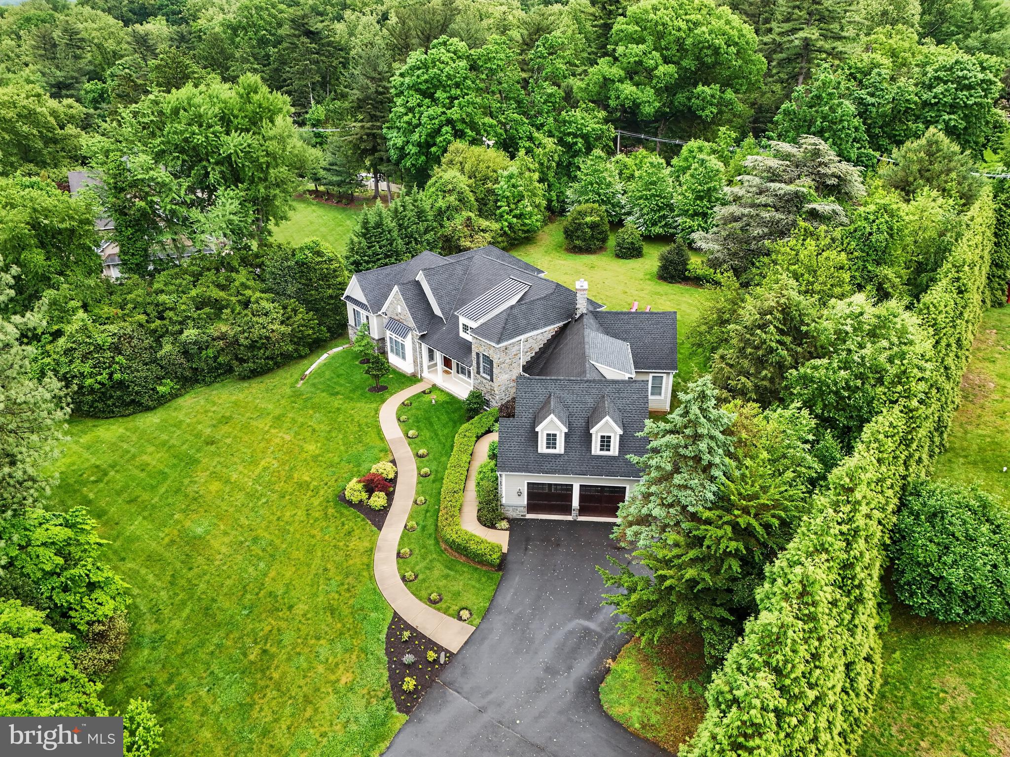 1031 Coates Road Jenkintown, PA 19046 - Photo 54 of 66 an aerial view of a house with a garden and trees