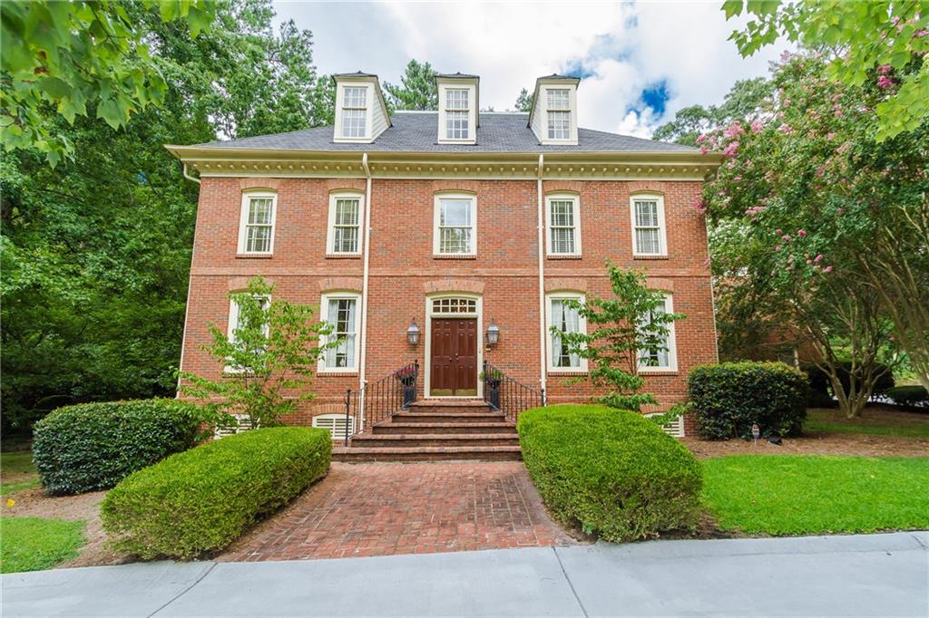 1401 Garmon Ferry Road Northwest Atlanta, GA 30327 - Photo 1 of 1 The beautiful Colonial Williamsburg style home has a brand new driveway and tons of parking for guests as well as a side entrance attached 2 car garage