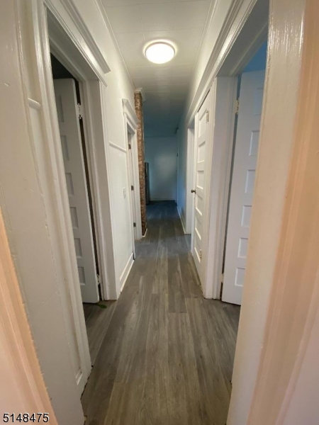 46 Prospect Street, Unit 2 Bloomfield, NJ 07003 - Photo 15 of 33 a view of a hallway with wooden floor and staircase