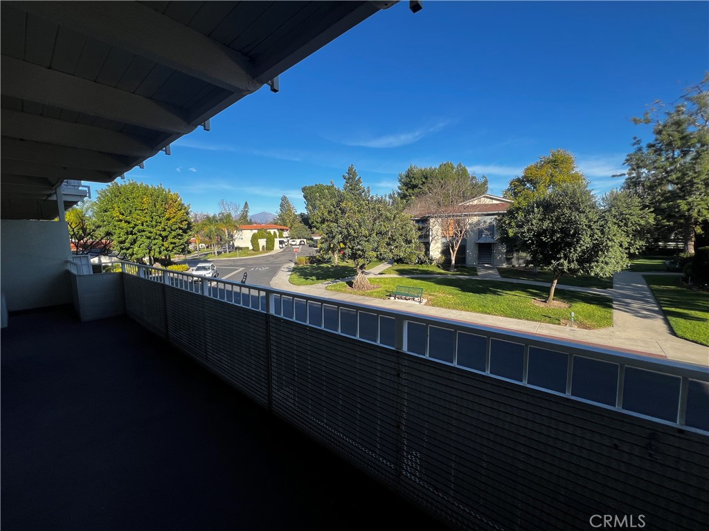 863 Ronda Mendoza, Unit B Laguna Woods, CA 92637 - Photo 15 of 37 a view of a swimming pool with a seating space