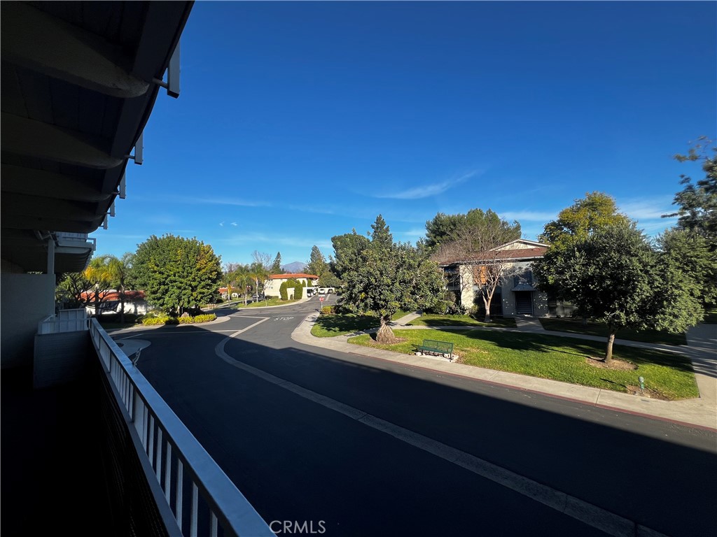 863 Ronda Mendoza, Unit B Laguna Woods, CA 92637 - Photo 16 of 37 a view of a balcony with yard
