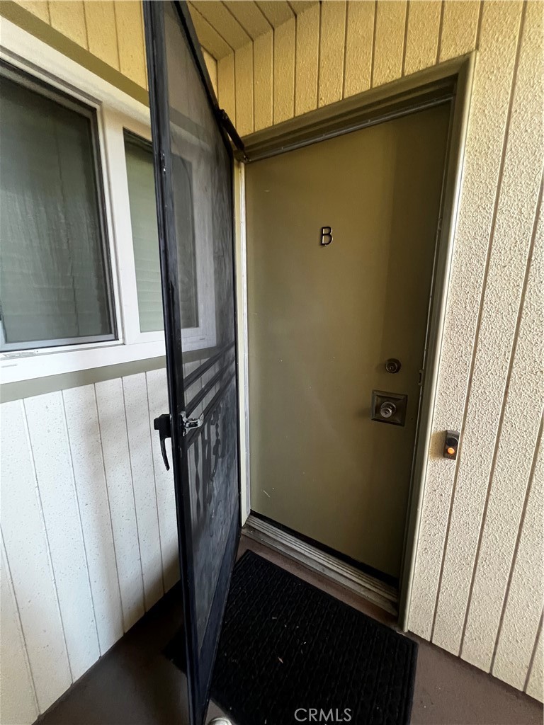 863 Ronda Mendoza, Unit B Laguna Woods, CA 92637 - Photo 4 of 37 a view of front door