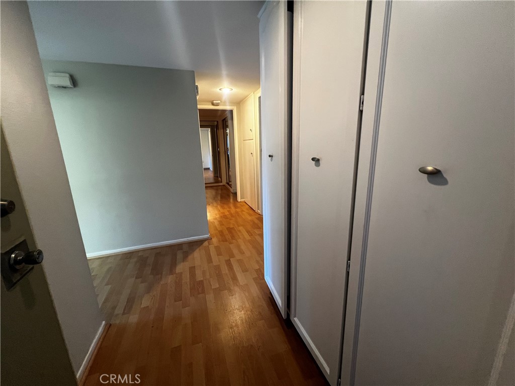 863 Ronda Mendoza, Unit B Laguna Woods, CA 92637 - Photo 6 of 37 a view of hallway with wooden floor
